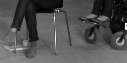 feets_and_wheels_of_a_wheelchair_photo_Bexcom